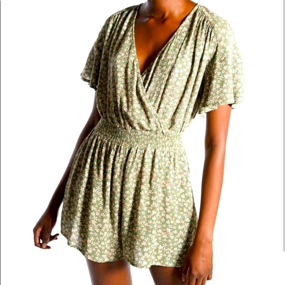 Flowered faux-wrap romper from The Latest Scoop